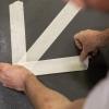 imageDuck Brand Professional Painters Tape 141 Inches by 60 Yards Beige 16 Rolls per Pack 284369141 Inch x 60 Yards